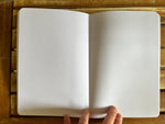 Ashram tree logo Large yellow A5 notebook with blank pages