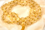 Mala en quartz rutile doré (perles 8mm)